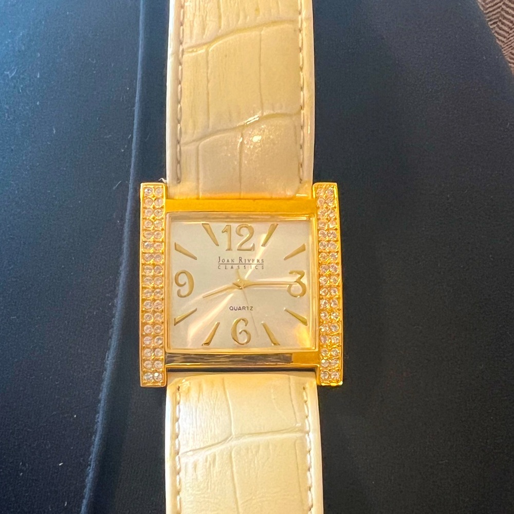Woman’s watch with alligator band & surrounded with faux diamonds